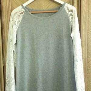 Grey Top with lace sleeves.